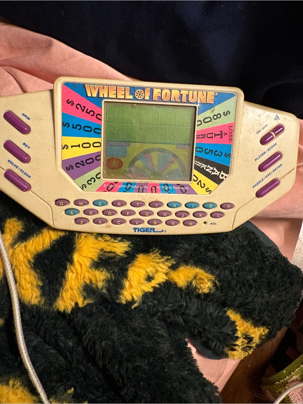 Wheel of Fortune Handheld Game - Cream and Purple